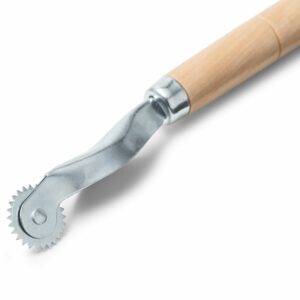 Roulette à patron dentelée